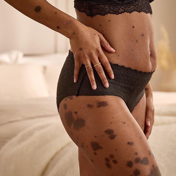 TENA Silhouette Plus Low Waist Black L—Navlékací kalhotky pro ženy 10ks